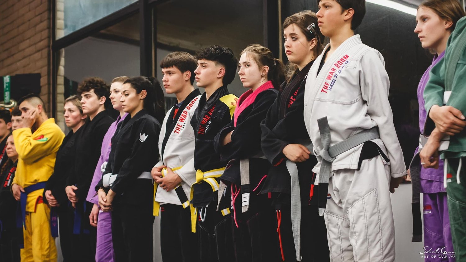 War Room students lined up before training
